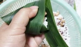 三角粽子的包法视频慢动作,慢动作解析，轻松学会传统美食制作